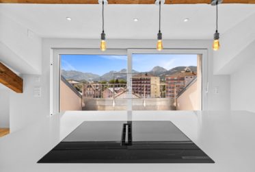 Loft rénové sous combles à Bulle