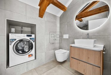 Loft rénové sous combles à Bulle